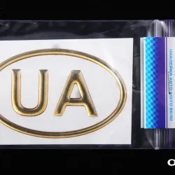 Наклейка UA силікон контур в овалі золотистий 5*8см "Автограф"